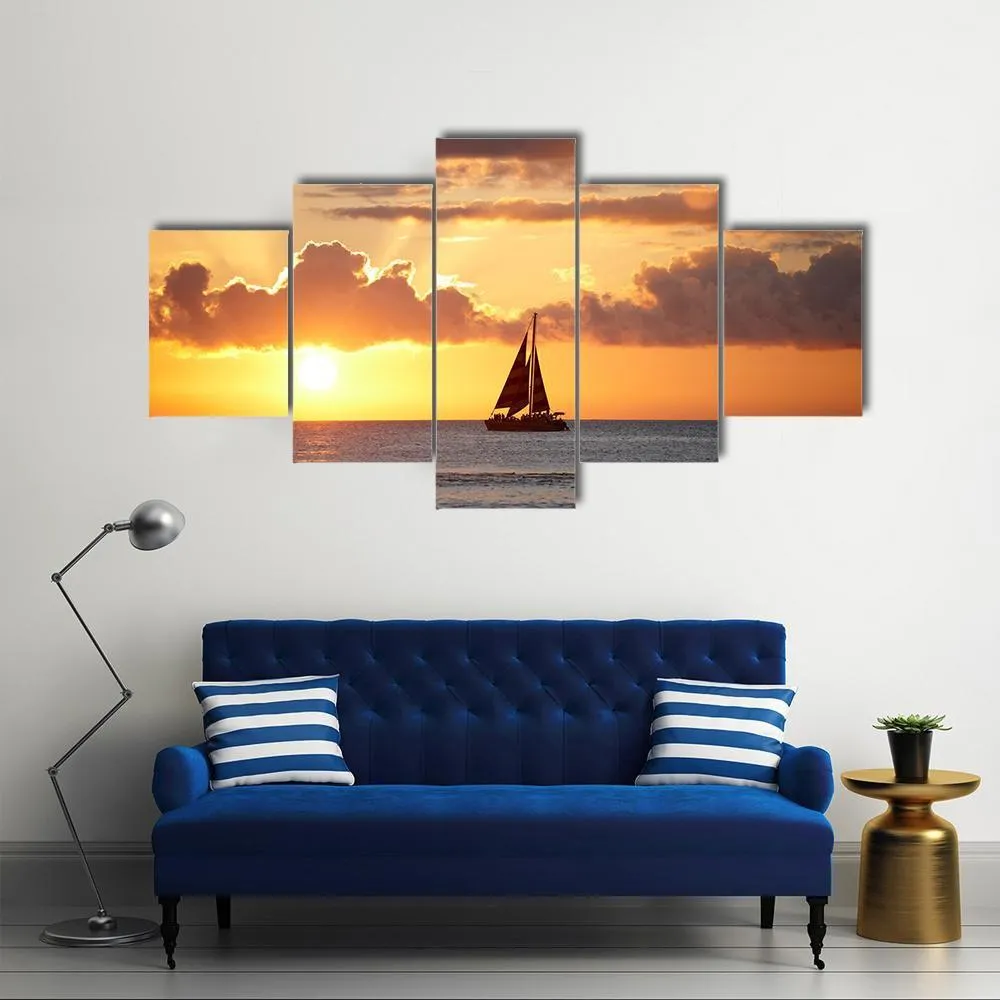 Boat In Ocean At Sunset Canvas Wall Art