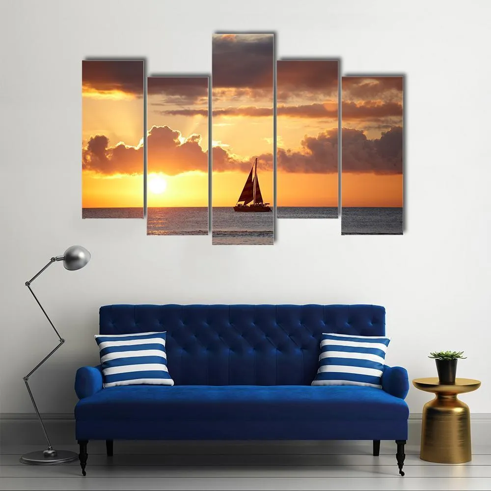 Boat In Ocean At Sunset Canvas Wall Art