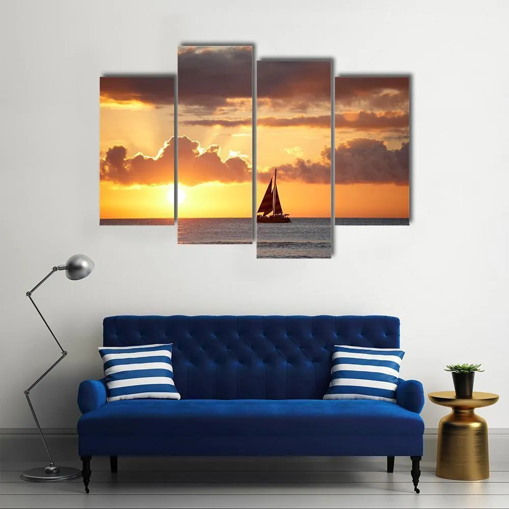 Boat In Ocean At Sunset Canvas Wall Art