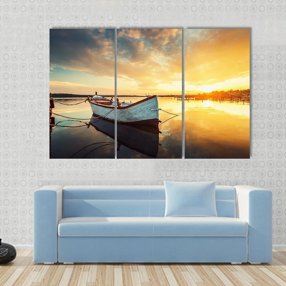 Boat On Lake At Sunset Canvas Wall Art