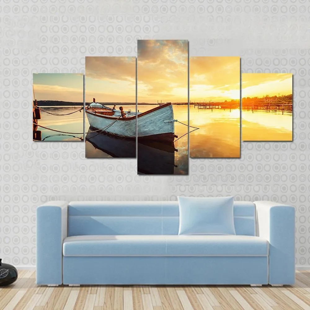 Boat On Lake At Sunset Canvas Wall Art